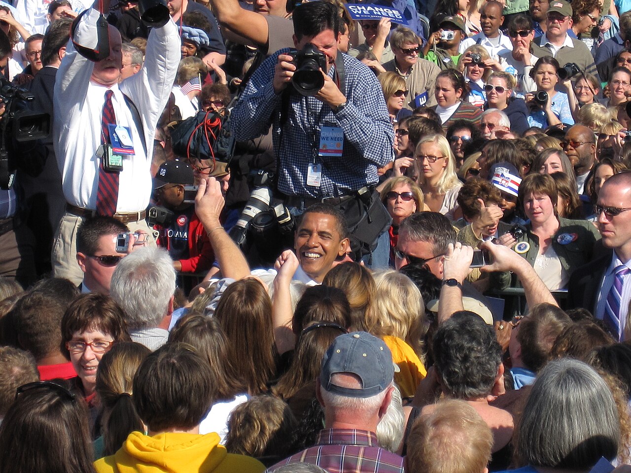 Candidate shaking hands with supporters at a campaign rally